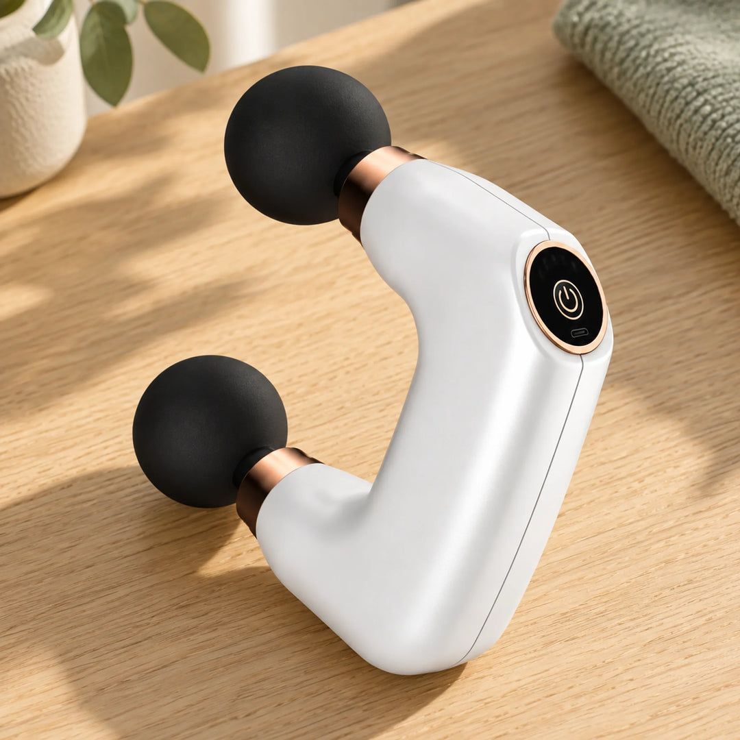 White dual-head percussion massager with two round heads