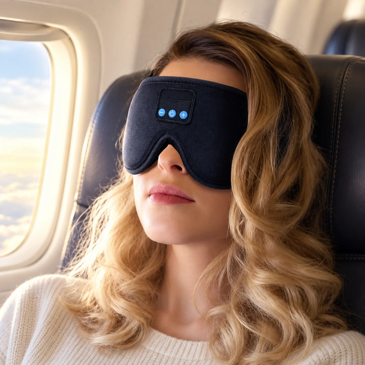 Contoured audio mask — seated passenger rest