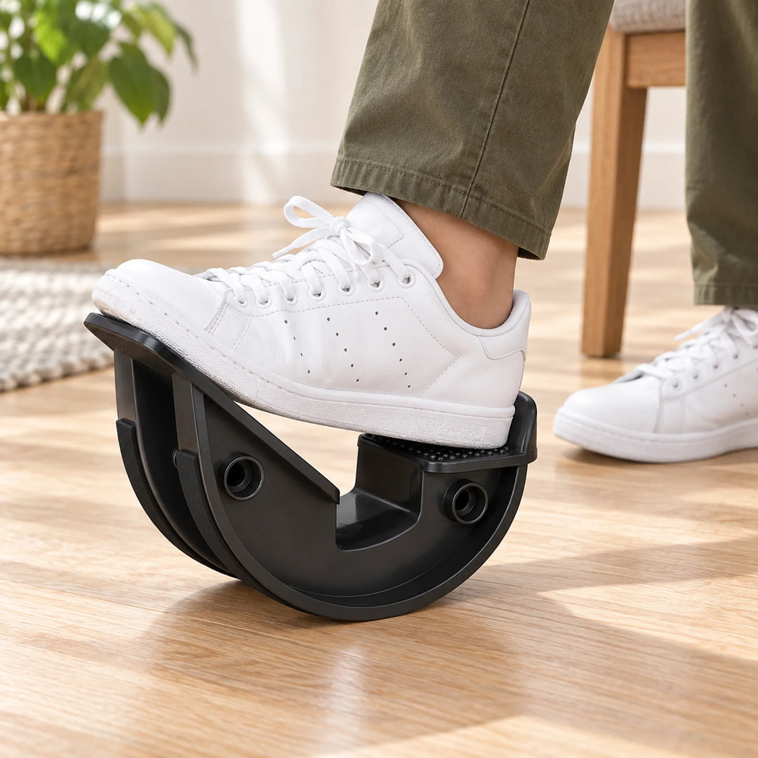 Manual foot rocker with shoe heel in rear cradle and forefoot on raised platform