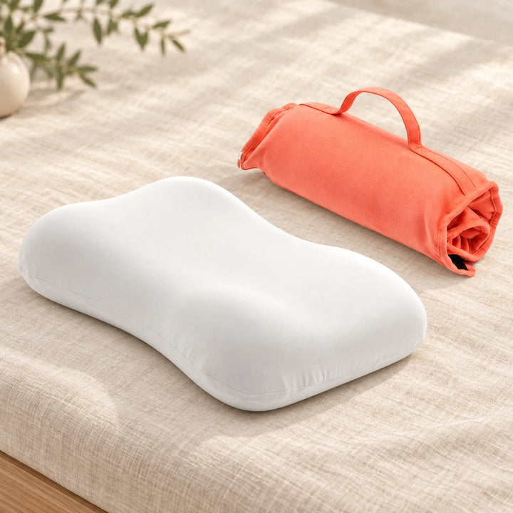 Compact contour travel pillow — Vibrant Coral